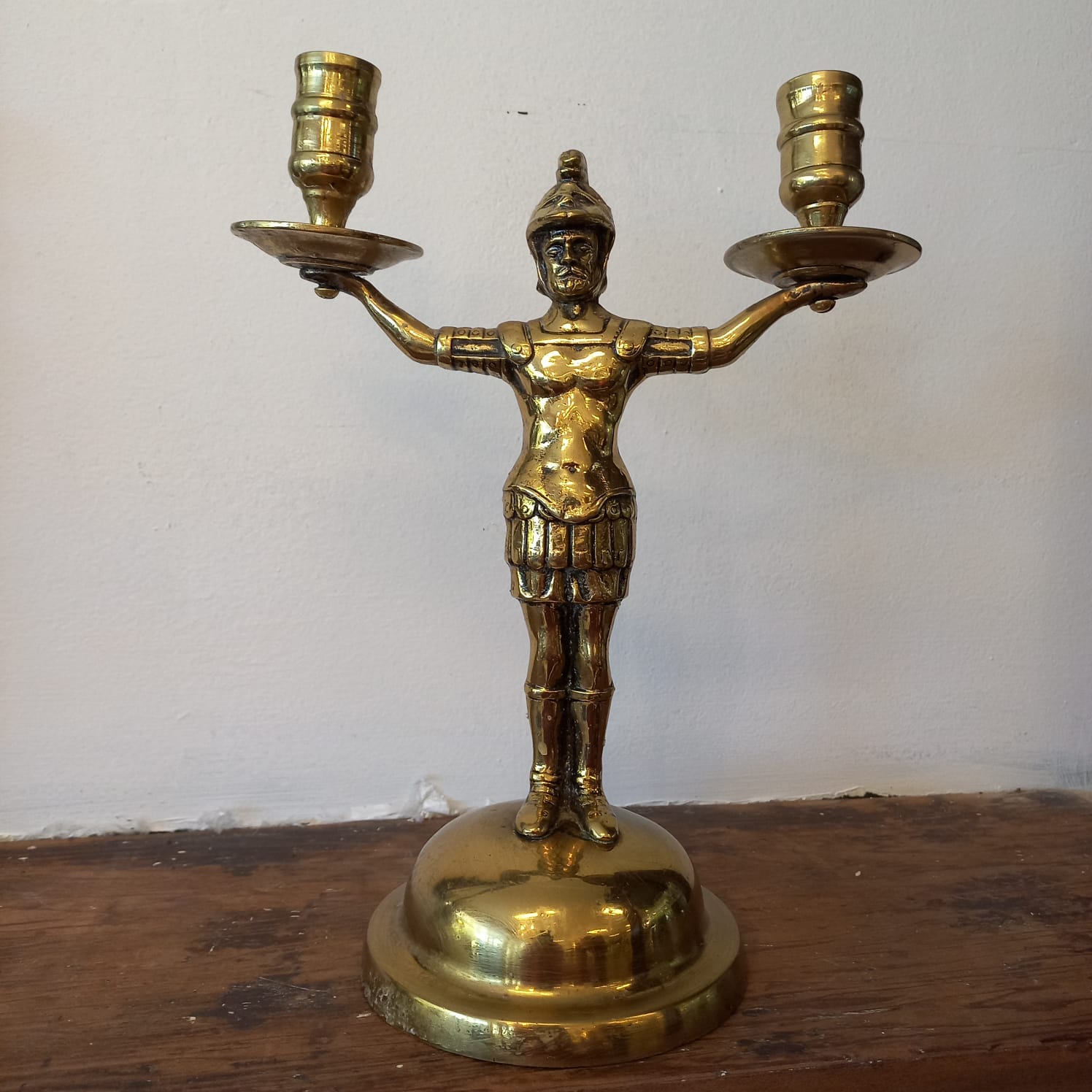 The main photo for Empire brass candle holder